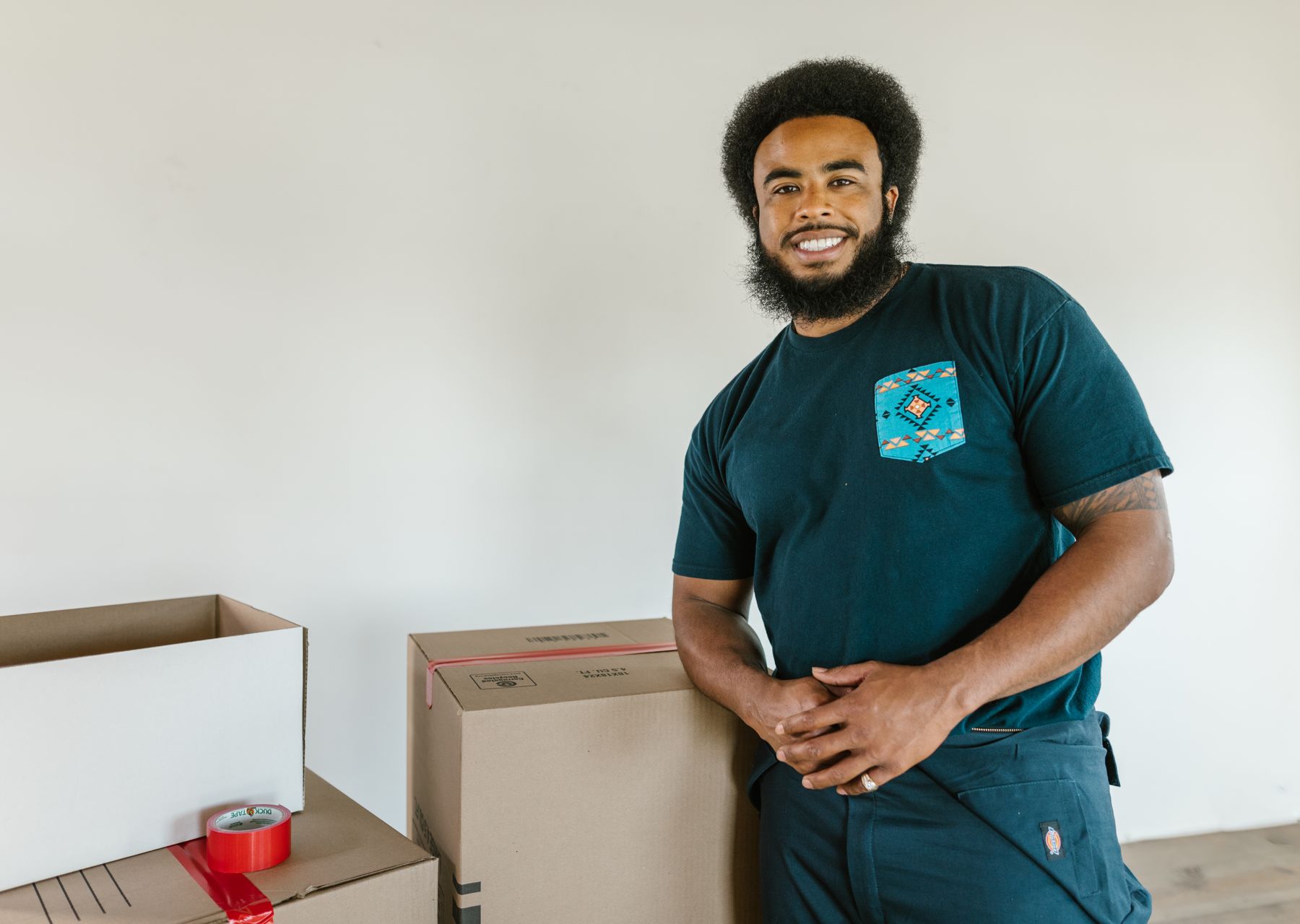 Professional removals crew at work — packing services Marham