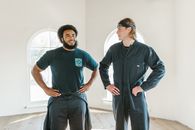 Men Standing with Hands on Their Waists