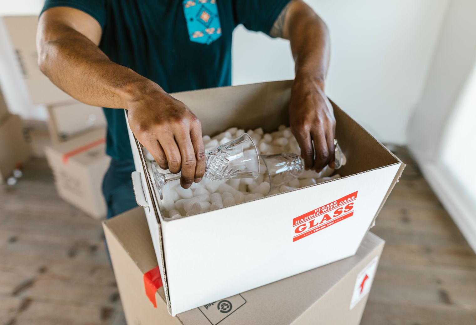 Emley — professional packers wrapping and boxing belongings