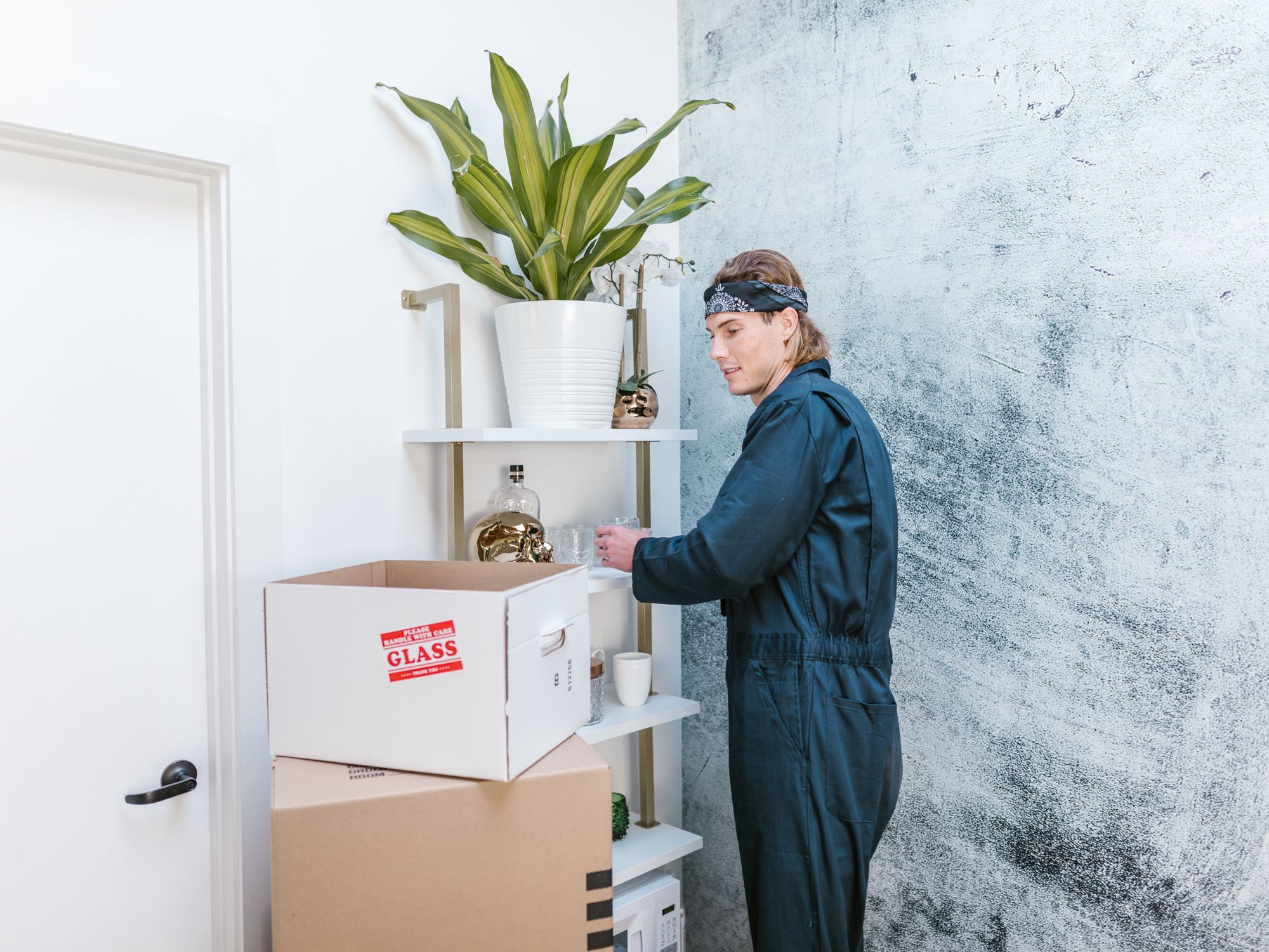 House Removals in Warminster, South West — professional movers carrying furniture on a house move