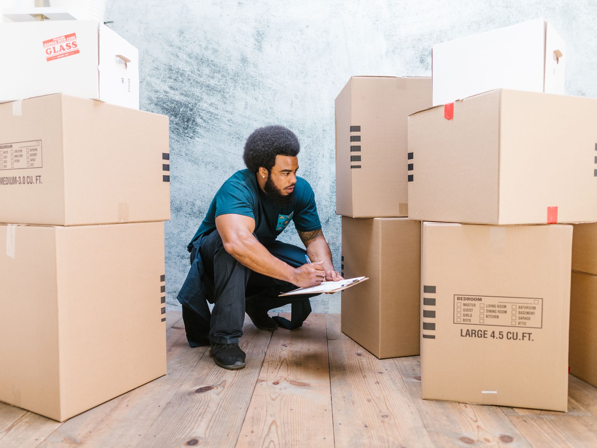 Packing & Materials in Ford End, South East — professional packers wrapping and boxing belongings