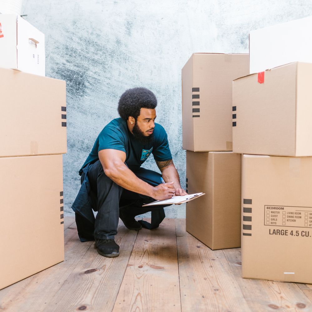 Wallacestone — movers carrying boxes for a flat move