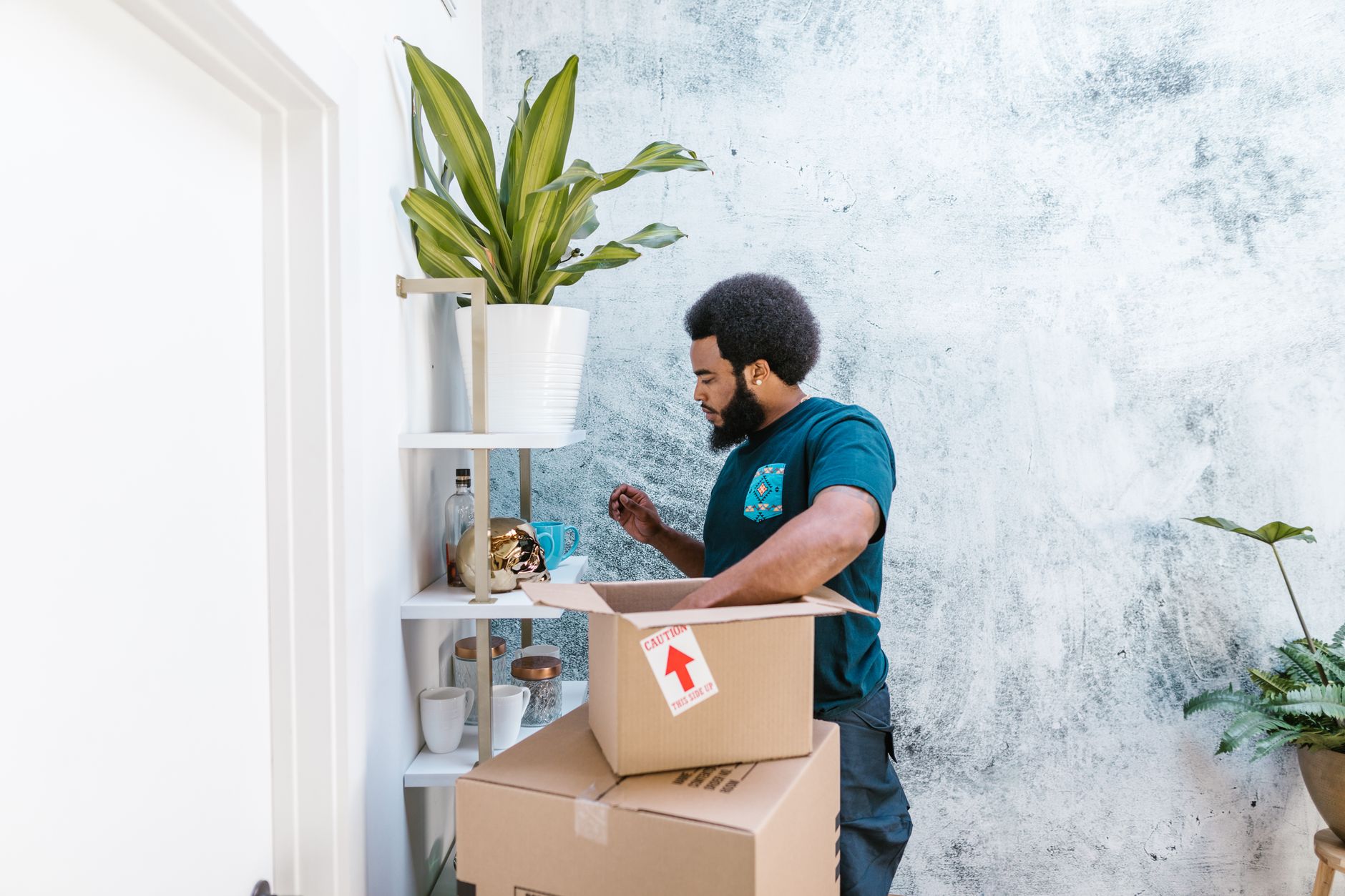 Neatly stacked moving boxes ready for a downsizing move in Phoenix