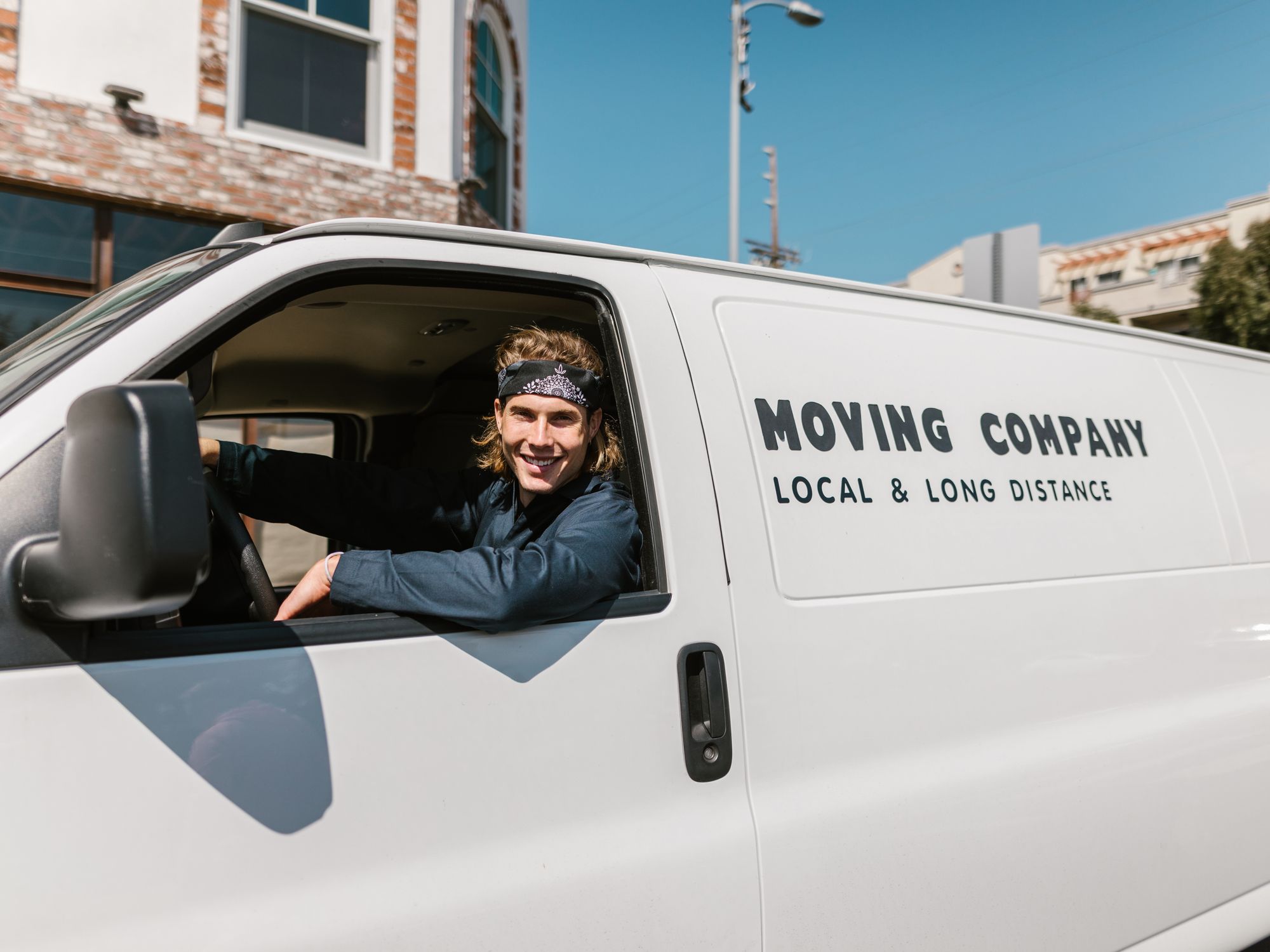 Furniture & Delivery in Loughborough, East Midlands — movers delivering furniture from a van
