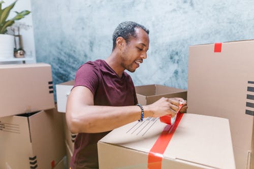 A Man Packing the Box 