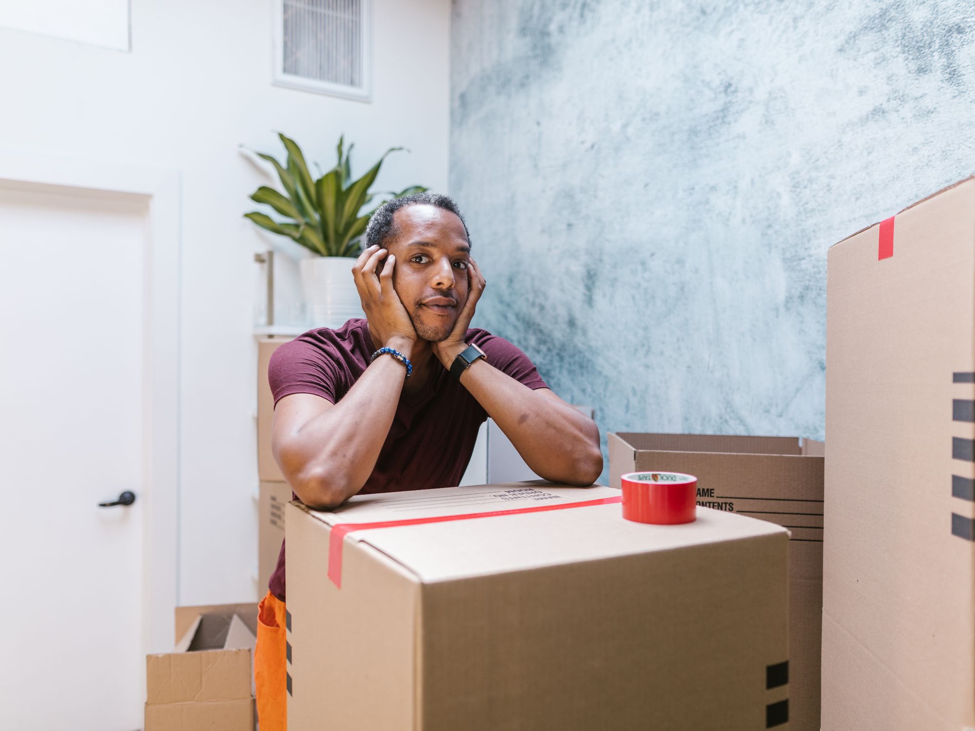 Flat Removals in Saint Ives, East of England — movers carrying boxes for a flat move