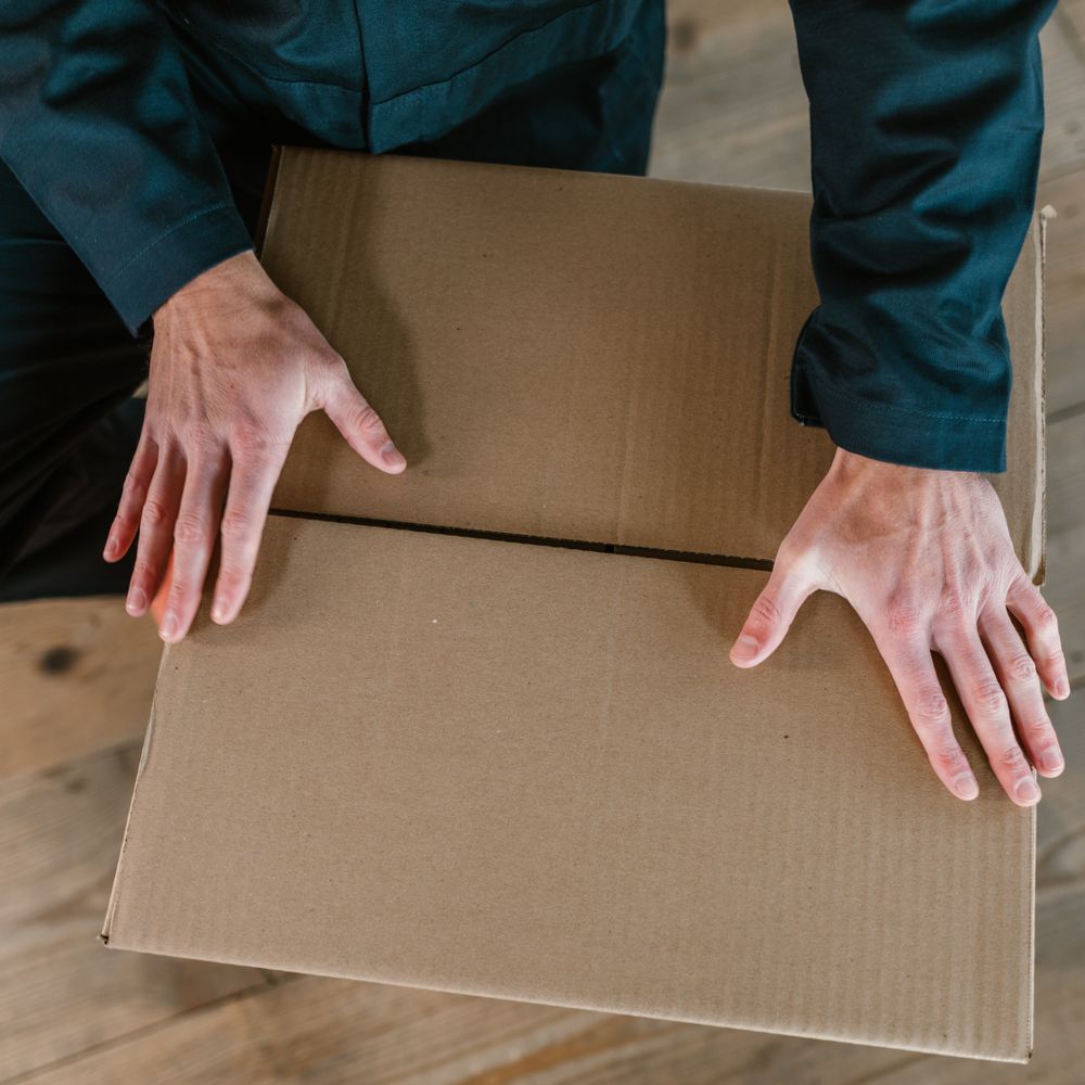 Halstead — professional packers wrapping and boxing belongings