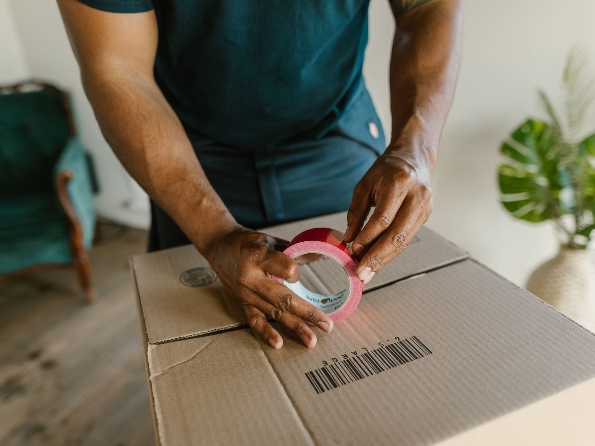 Flat Removals in Blendon, South East London — movers carrying boxes for a flat move