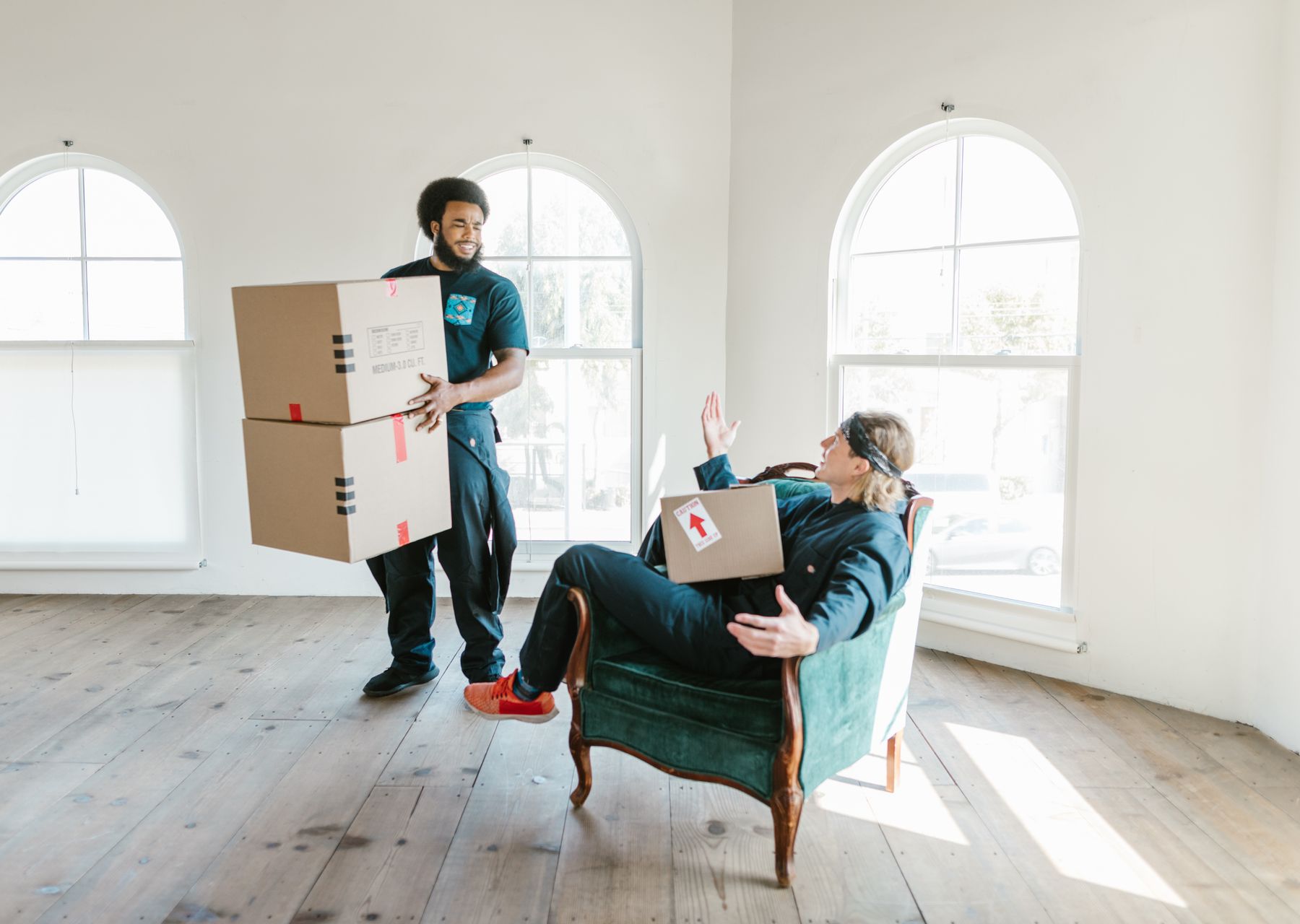 Packing services in Wickwar — crew wrapping and loading on moving day