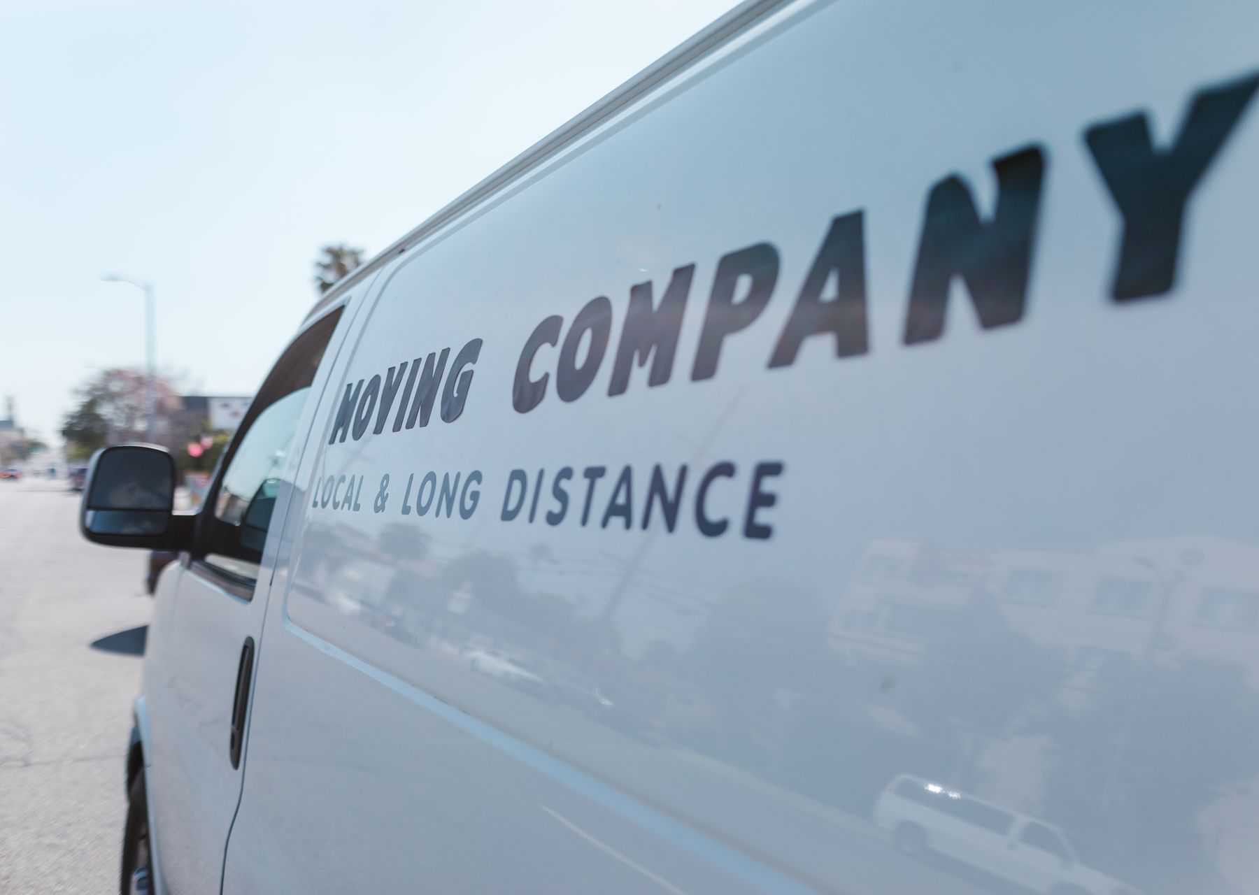 Man and van in Tangmere — crew wrapping and loading on moving day