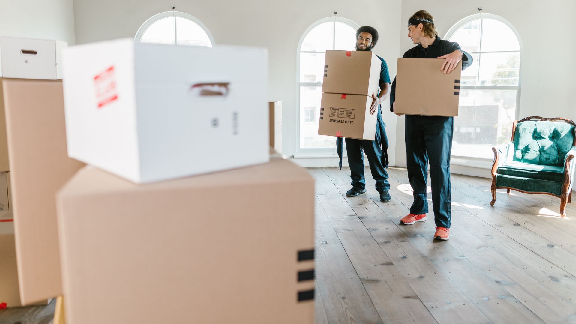 Professional movers working together to clear a property