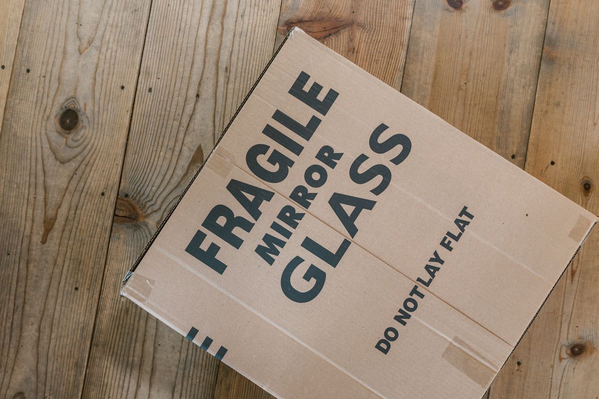 Loading moving truck with furniture and storage bins - How to Measure Irregular Angles, Curves, and Alcoves for Moving Truck Volume
