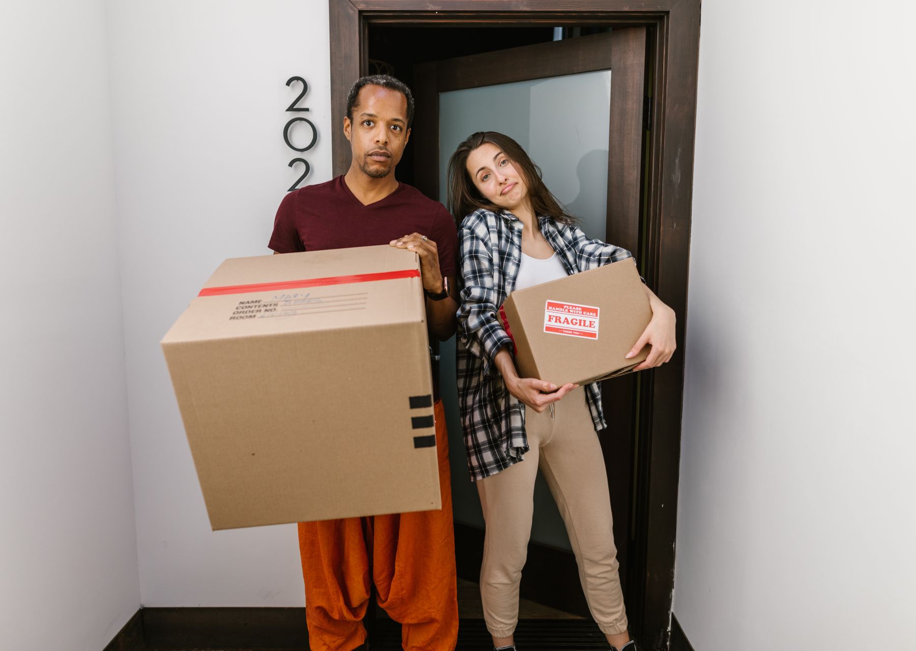 Removals and storage in Copthorne — crew wrapping and loading on moving day