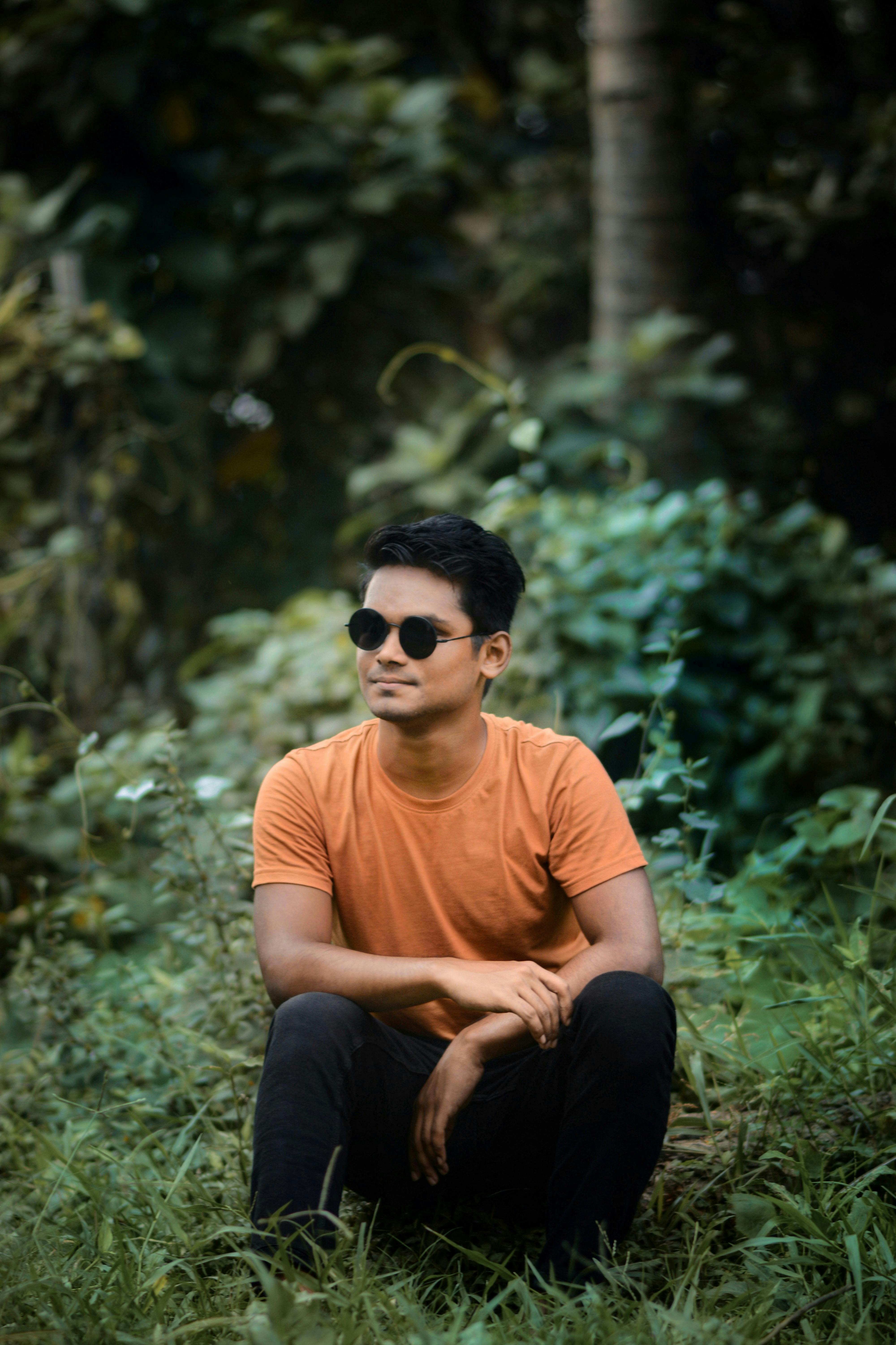 araffe sitting on a tree in a forest with a watch, looking majestic in  forest, casual photography, in front of a forest background, in forest  jungle - SeaArt AI