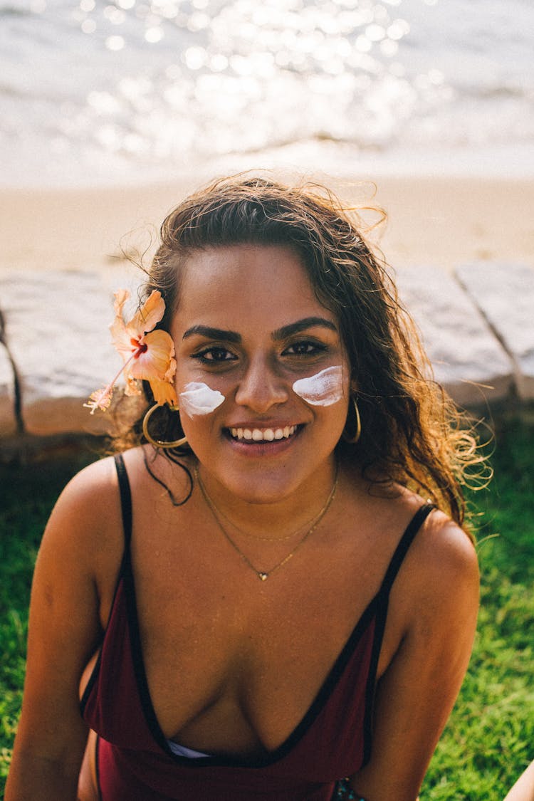 White Cream On The Woman's Cheeks 