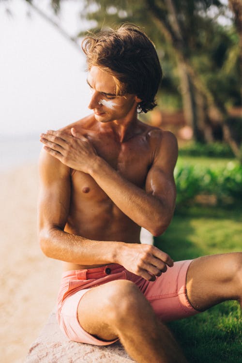 Man Putting Sunscreen