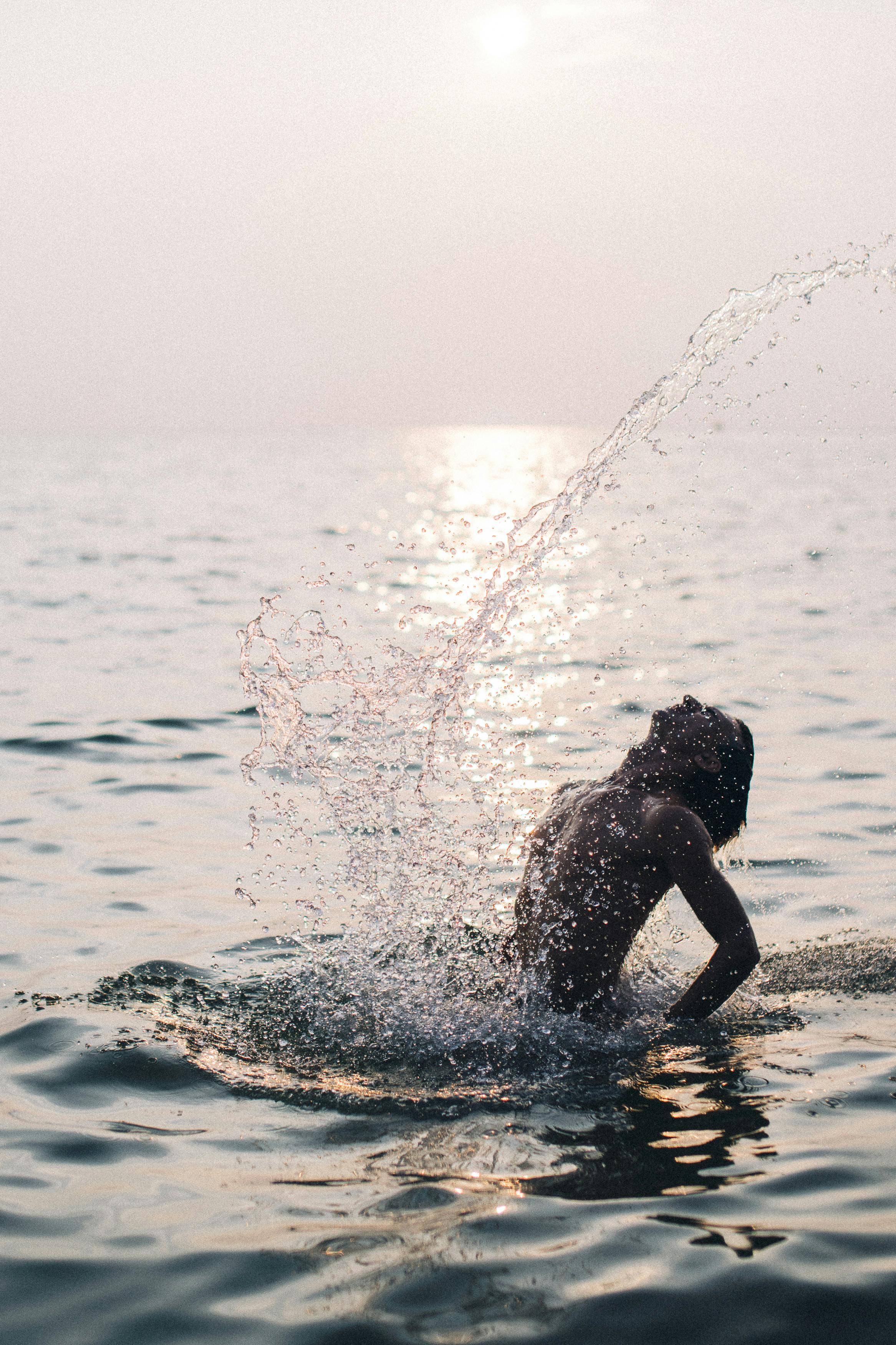 Woman in Black Bikini on Water · Free Stock Photo