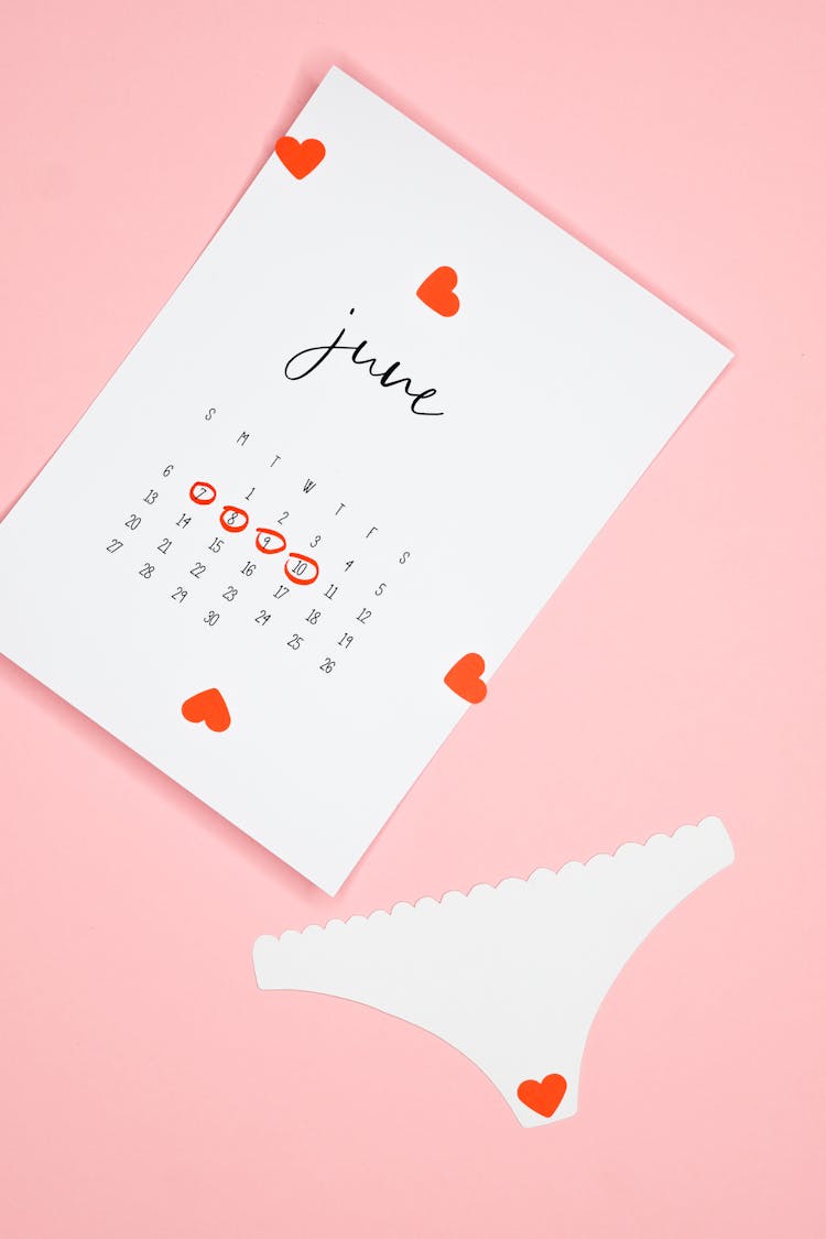 Period Calendar On Pink Background