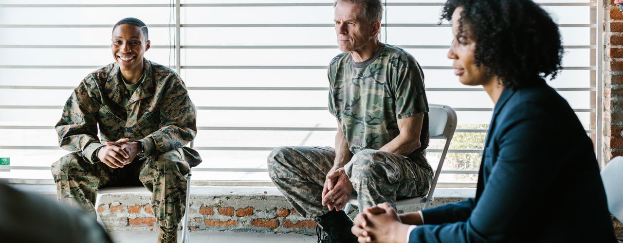 Veterans gathered in a group meeting at a community post