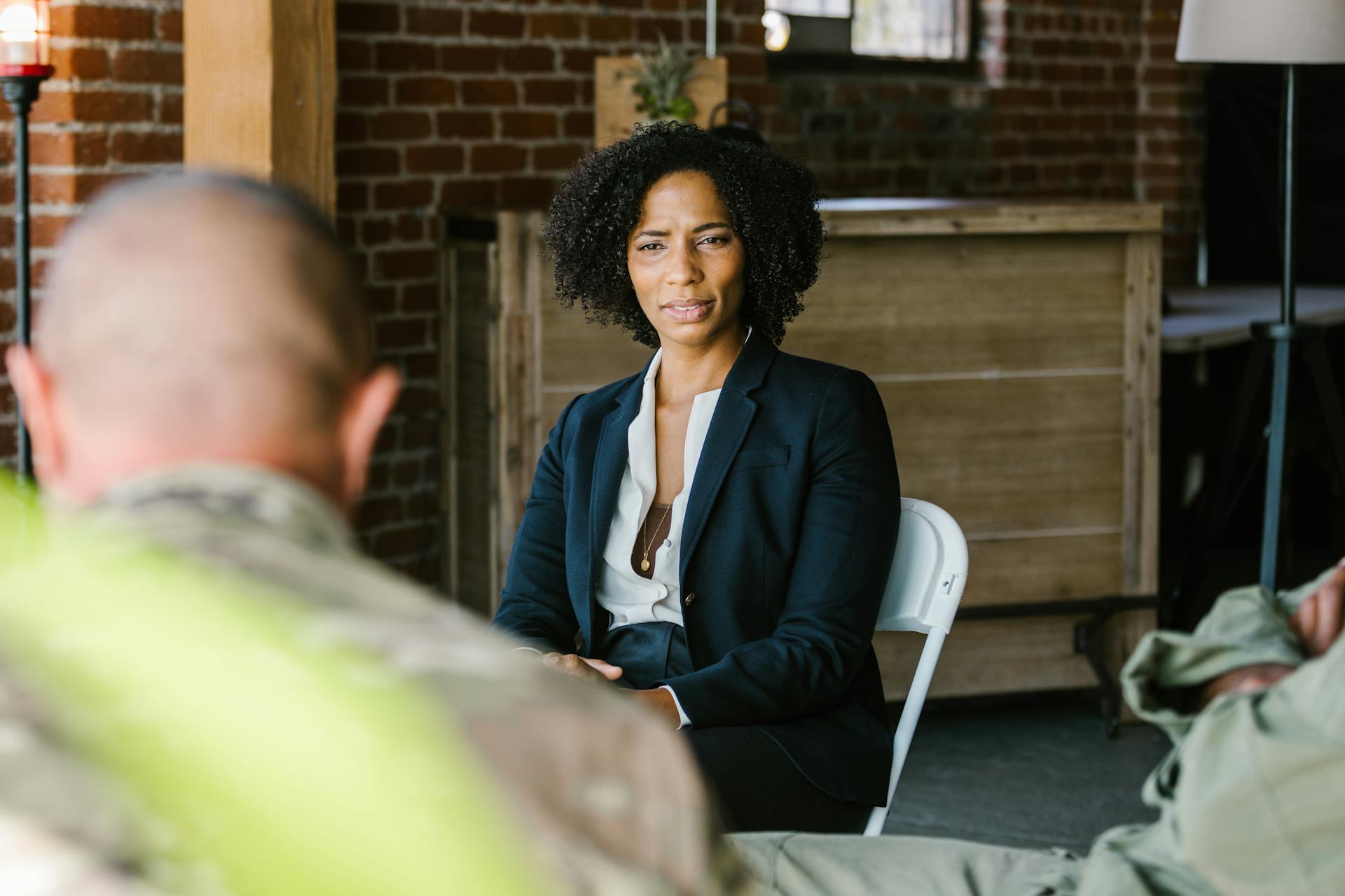 Photo of Psychologist Talking to Soldiers