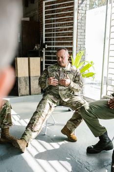Photo by RDNE Stock project Military veterans engage in a group therapy session focusing on mental health and recovery.