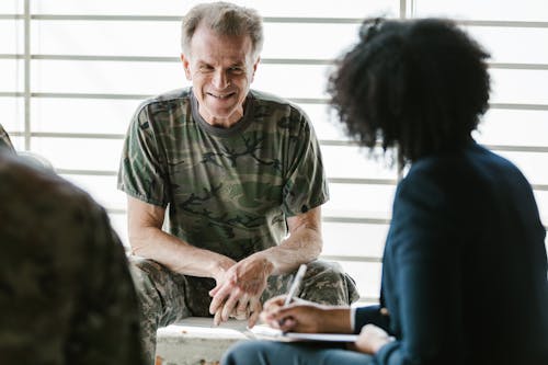 Photo of Soldier Smiling at the Therapist