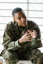 Photo of Soldier Wearing Green and Brown Camouflage Uniform