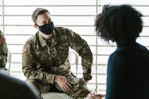 Free Photo of Soldier Listening to a Psychologist Stock Photo