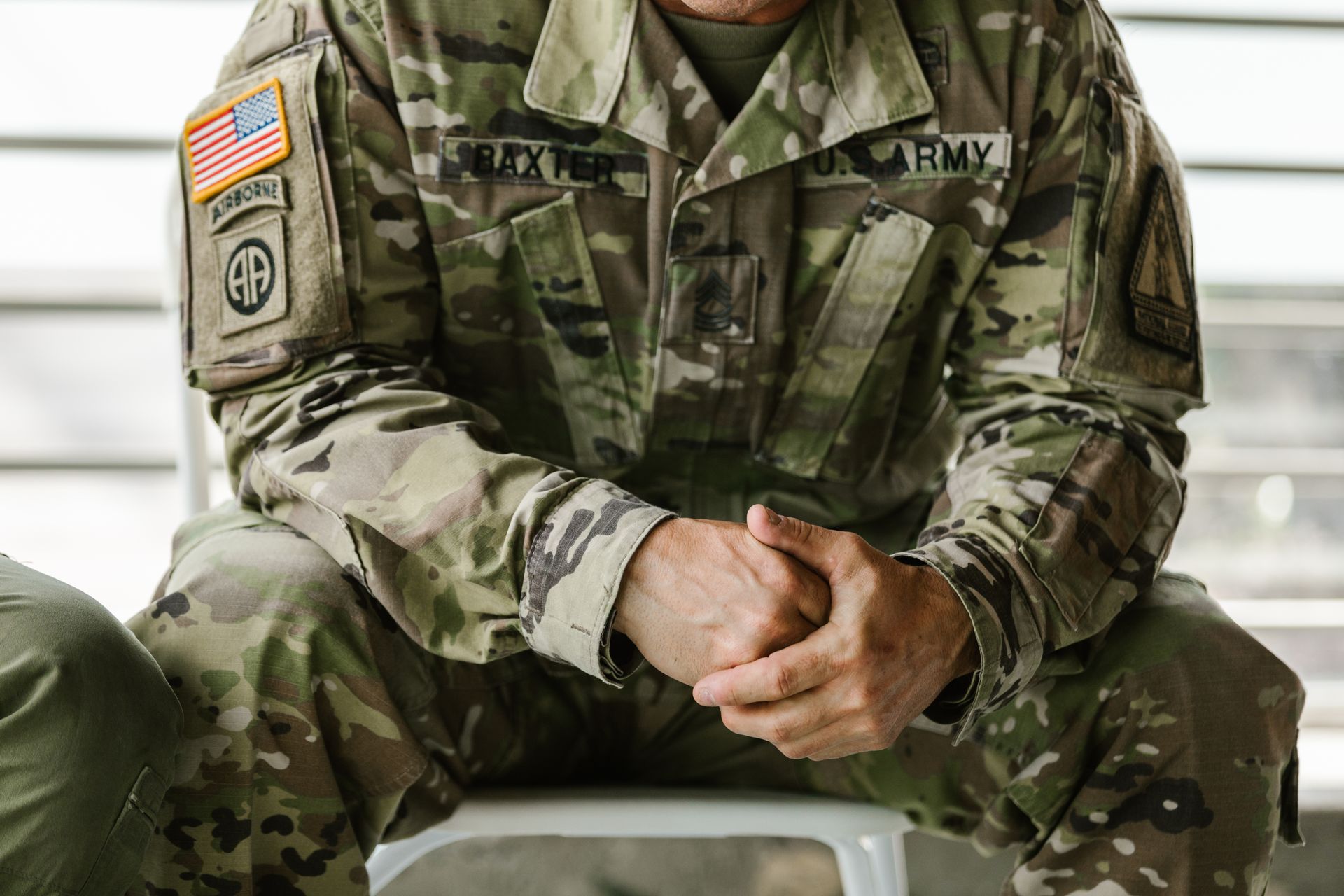 Close-up of an American flag patch on a US Army uniform