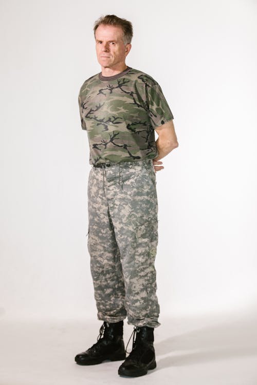 Free Full Body Shot of a Soldier in a Studio Stock Photo
