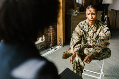 Photo of Soldier Talking to a Therapist