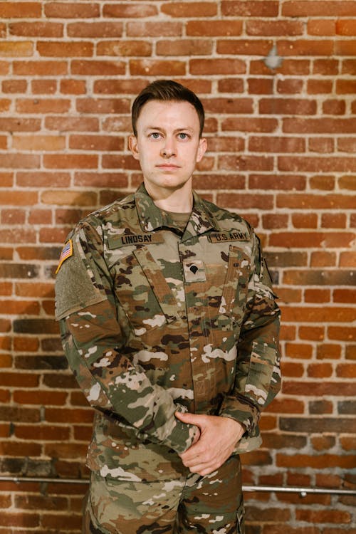Free Photo of Soldier Wearing Green and Brown Camouflage Uniform  Stock Photo