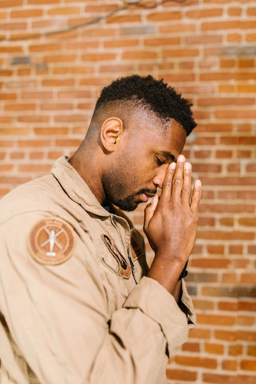 Free Side View Photo of Praying Man  Stock Photo