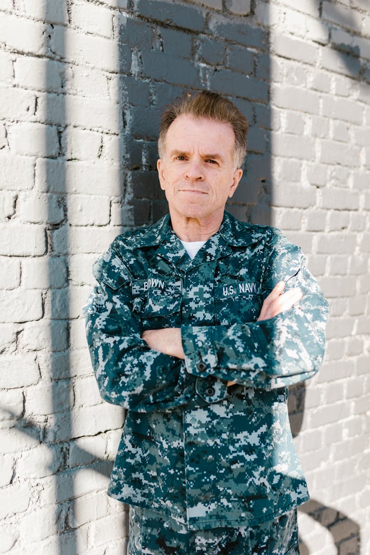 Photo Of A Senior Adult Wearing Military Uniform 