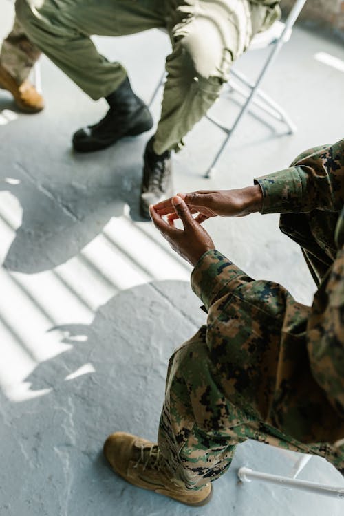 Photo of Veterans Sitting on a Chair