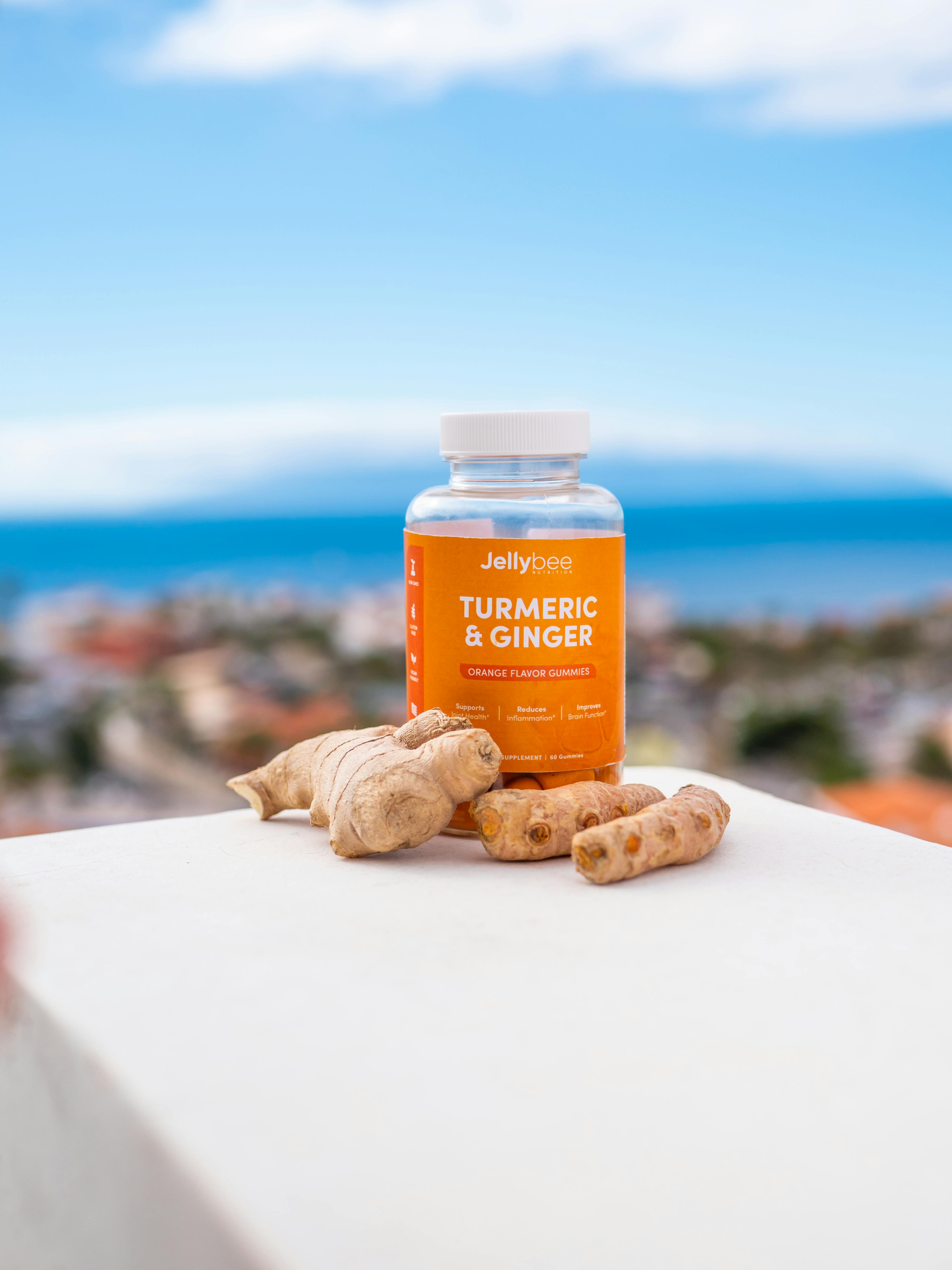 orange plastic bottle on white table