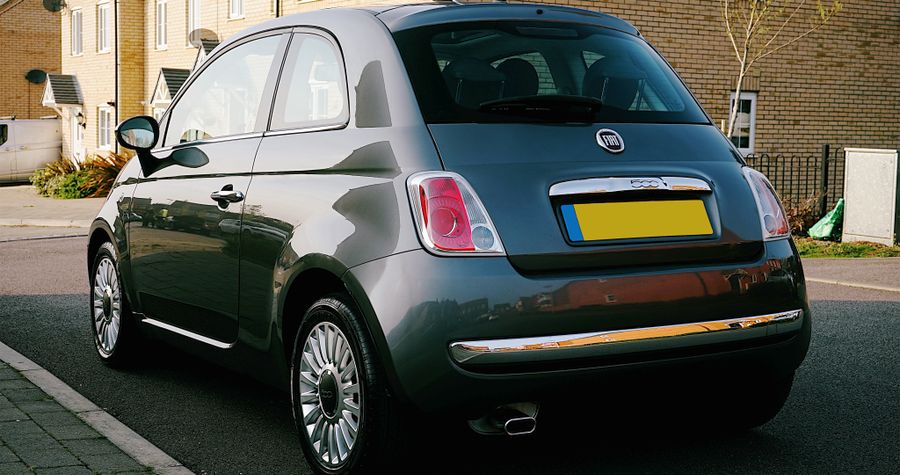 Compact grey hatchback rental car