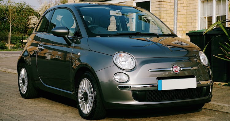 Gray Fiat 500 Car Parked On The Road 