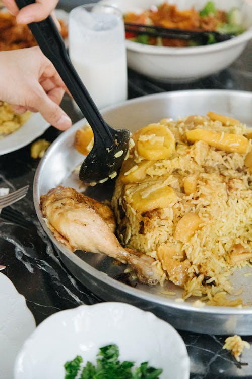 Cooked Chicken Biryani in a Stainless Wok