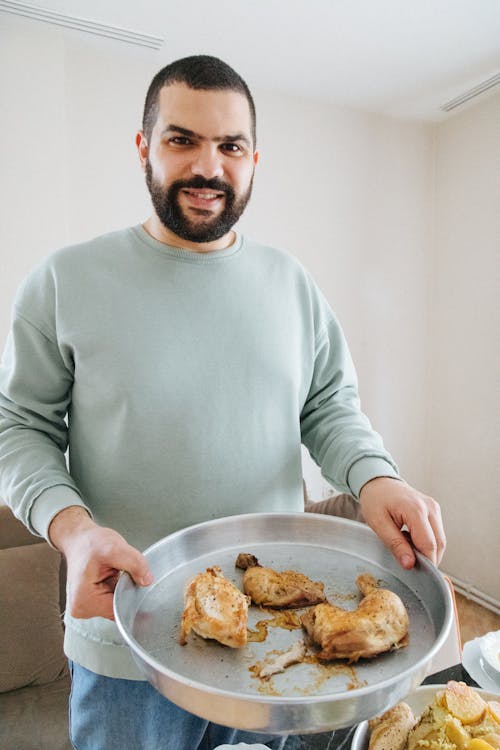 Man with Pan of Fried Chicken