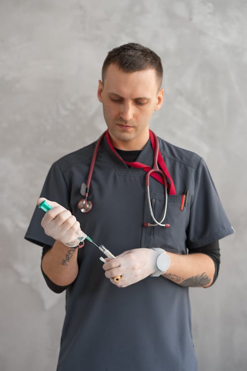 Man Holding a Syringe
