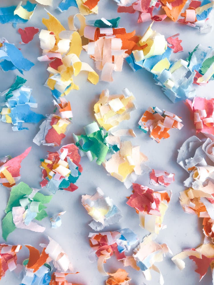 Multicolored Scraps Of Paper On Surface