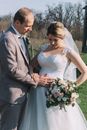 Man Holding the Belly of the Bride