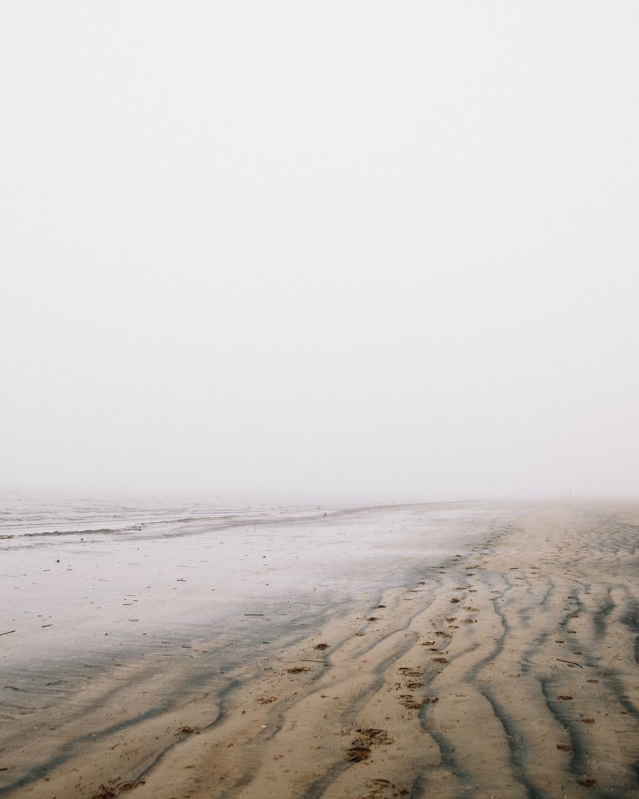 Fog sitting low over the sand at Ocean Beach