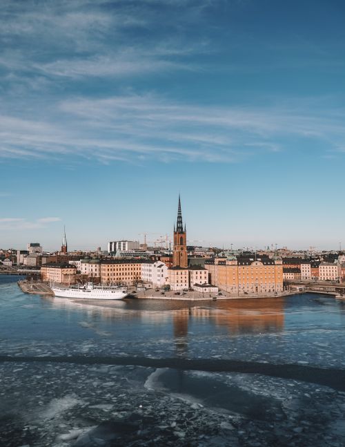 Free Captured from above, enjoy a stunning winter scene of Stockholm's waterways and architecture. Stock Photo
