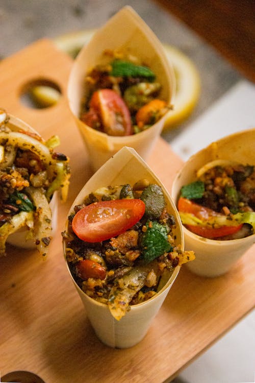 Close-up of Delicious Food in Paper Cups 