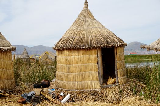 Beautiful reed hut on Lake Titicaca, Peru. Captures rural lifestyle and unique architecture.