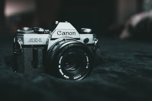 Free Close-up of a vintage Canon AE-1, highlighting the intricate design and classic appeal. Stock Photo