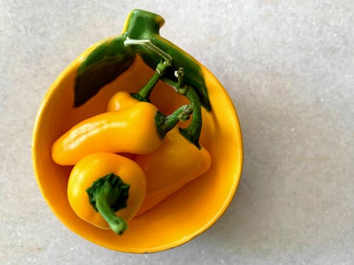 Free Yellow Bell Pepper on a Bowl Stock Photo