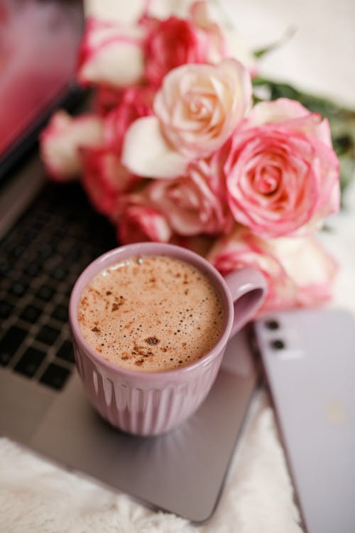 Free A Pink Ceramic Mug With Coffee Stock Photo